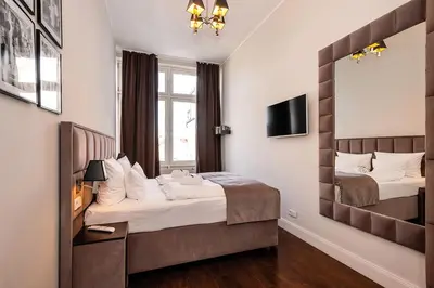 Ein Bett oder Betten in einem Zimmer der Unterkunft Arabel Design Apartments