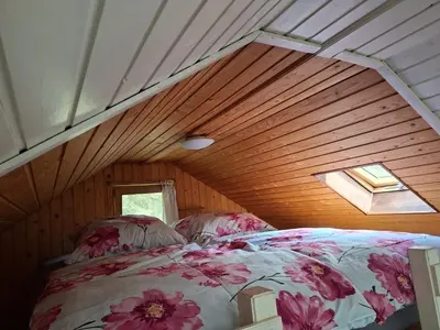 Ein Bett oder Betten in einem Zimmer der Unterkunft Ferienhaus im Sonnental