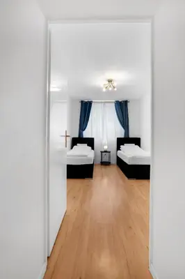 Ein Bett oder Betten in einem Zimmer der Unterkunft central 3 Bedroom Apartment in Kreuzberg
