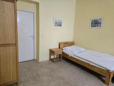 Ein Bett oder Betten in einem Zimmer der Unterkunft Schulsportverein Lichtenrade e V