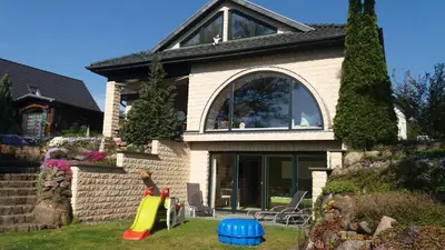 Ein Garten an der Unterkunft KAMA Ferienhäuser Haus Kathrin