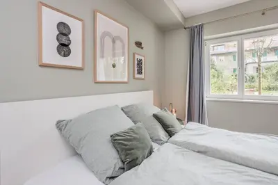 Ein Bett oder Betten in einem Zimmer der Unterkunft Urban-Oasis: Zentral, Ruhig, Neu!