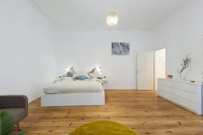 Ein Bett oder Betten in einem Zimmer der Unterkunft Wichertstraße 47