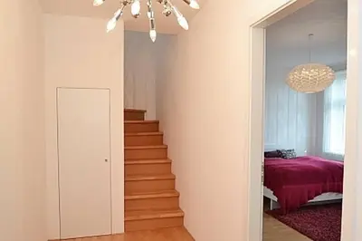 Ein Bett oder Betten in einem Zimmer der Unterkunft Stylish maisonette, Prenzlauer Berg, 70m2