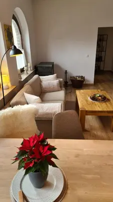 Ein Sitzbereich in der Unterkunft Ferienwohnung AM SPREEUFER