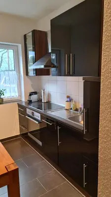Küche/Küchenzeile in der Unterkunft Ferienwohnung AM SPREEUFER