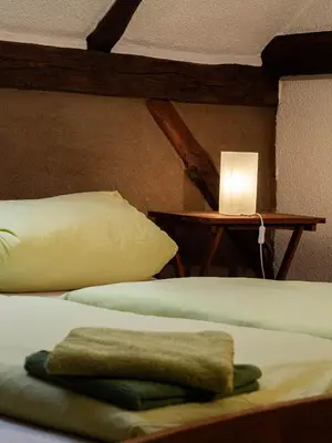 Ein Bett oder Betten in einem Zimmer der Unterkunft Ferienhof Bahlens-Schur