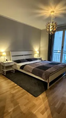 Ein Bett oder Betten in einem Zimmer der Unterkunft Traumhafte Wohnung mitten in Charlottenburg