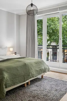 Ein Bett oder Betten in einem Zimmer der Unterkunft Traumhafte Wohnung mitten in Charlottenburg