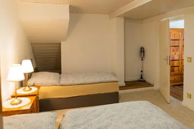 Ein Bett oder Betten in einem Zimmer der Unterkunft Sabina Ferienhaus