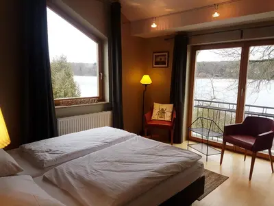 Ein Bett oder Betten in einem Zimmer der Unterkunft Hotel Fährhaus GmbH