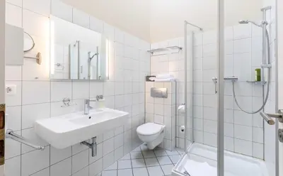 Ein Badezimmer in der Unterkunft Hotel Fährhaus GmbH