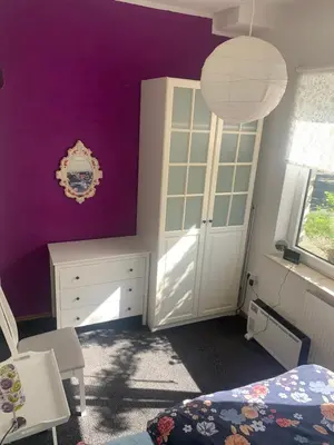 Ein Bett oder Betten in einem Zimmer der Unterkunft Ferienwohnung Puttenusenhof