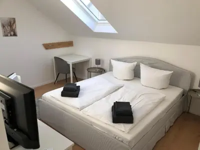 Ein Bett oder Betten in einem Zimmer der Unterkunft Zur Mühle