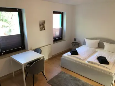 Ein Bett oder Betten in einem Zimmer der Unterkunft Zur Mühle