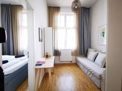 Ein Bett oder Betten in einem Zimmer der Unterkunft SC 07 by ROCKCHAIR Apartments l SUPERHOST Status l 2,5 Bedrooms Boxspringbeds Balcony Elevator welcomes you!
