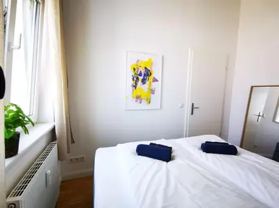 Ein Bett oder Betten in einem Zimmer der Unterkunft SC 07 by ROCKCHAIR Apartments l SUPERHOST Status l 2,5 Bedrooms Boxspringbeds Balcony Elevator welcomes you!