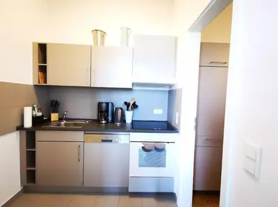 Küche/Küchenzeile in der Unterkunft SC 07 by ROCKCHAIR Apartments l SUPERHOST Status l 2,5 Bedrooms Boxspringbeds Balcony Elevator welcomes you!