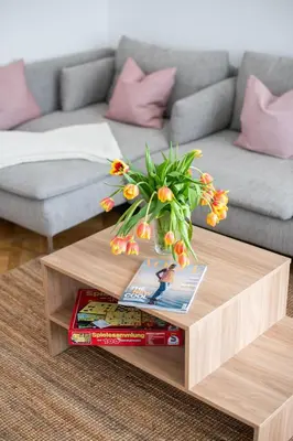 Ein Sitzbereich in der Unterkunft KAISER 02 by ROCKCHAIR Apartments l SUPERHOST Status l 3 Bedrooms Boxspringbeds 2 Bathrooms l Cozy Family & Business Flair 155 sqm 3 Balcony 2nd Floor Elevator up to 10 guests welcomes you!