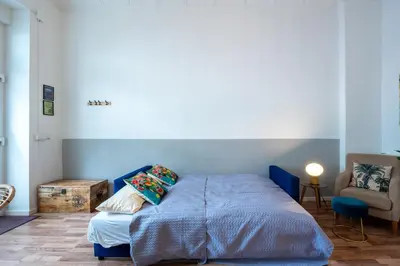 Ein Bett oder Betten in einem Zimmer der Unterkunft Modern, Central flat with workspace