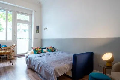 Ein Bett oder Betten in einem Zimmer der Unterkunft Modern, Central flat with workspace