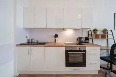 Küche/Küchenzeile in der Unterkunft Modern, Central flat with workspace