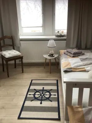 Ein Bett oder Betten in einem Zimmer der Unterkunft Ferienwohnung zur alten Waage