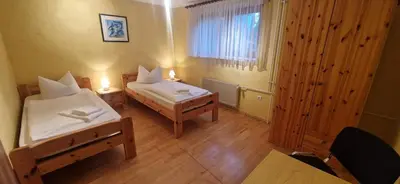 Ein Bett oder Betten in einem Zimmer der Unterkunft BusinessHotel Mühlenbeck