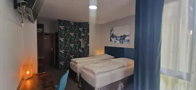 Ein Bett oder Betten in einem Zimmer der Unterkunft BusinessHotel Mühlenbeck