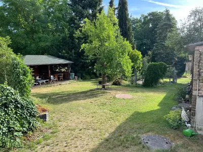 Ein Garten an der Unterkunft Ferienglück Isolde mit direktem Zugang zum See