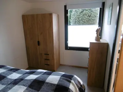 Ein Bett oder Betten in einem Zimmer der Unterkunft Ferienbungalow Am Birkenwäldchen