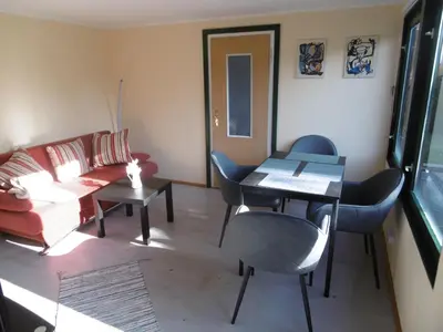 Ein Sitzbereich in der Unterkunft Ferienbungalow Am Birkenwäldchen