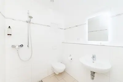 Ein Badezimmer in der Unterkunft GASTEM UG