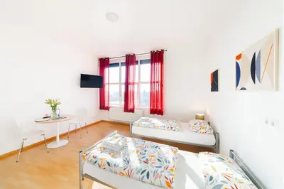 Ein Bett oder Betten in einem Zimmer der Unterkunft GASTEM UG