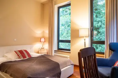 Ein Bett oder Betten in einem Zimmer der Unterkunft Schloss Blankensee exklusiv