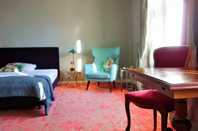 Ein Bett oder Betten in einem Zimmer der Unterkunft Schloss Blankensee exklusiv