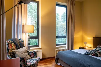 Ein Bett oder Betten in einem Zimmer der Unterkunft Schloss Blankensee exklusiv