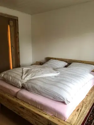 Ein Bett oder Betten in einem Zimmer der Unterkunft Wohnung in Wald- und Seenähe