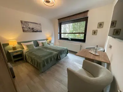 Ein Bett oder Betten in einem Zimmer der Unterkunft HOLI DAY SPA 2-Bett Zimmer App 3