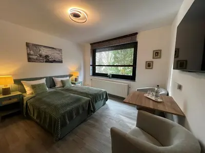 Ein Bett oder Betten in einem Zimmer der Unterkunft HOLI DAY SPA 2-Bett Zimmer App 3