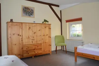 Ein Bett oder Betten in einem Zimmer der Unterkunft Ferienwohnung Siebmann