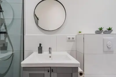 Ein Badezimmer in der Unterkunft Spacious, central 3 room flat with gym & play area