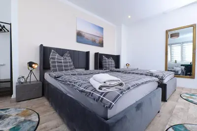 Ein Bett oder Betten in einem Zimmer der Unterkunft Apartment - Lilo Monteur - Ferienwohnung