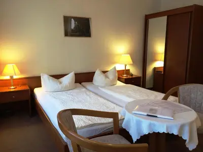 Ein Bett oder Betten in einem Zimmer der Unterkunft Pension an der Havelbucht