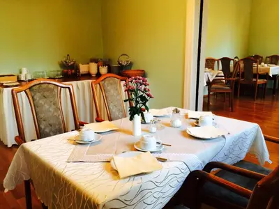 Ein Restaurant oder anderes Speiselokal in der Unterkunft Pension an der Havelbucht
