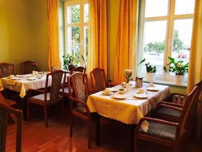 Ein Sitzbereich in der Unterkunft Pension an der Havelbucht