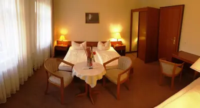 Ein Sitzbereich in der Unterkunft Pension an der Havelbucht