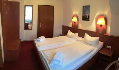 Ein Bett oder Betten in einem Zimmer der Unterkunft Pension an der Havelbucht