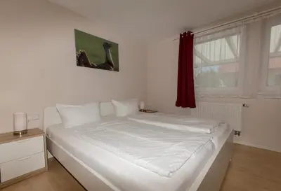 Ein Bett oder Betten in einem Zimmer der Unterkunft Ferienhaus Großtrappe im Sternenpark