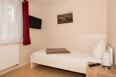 Ein Bett oder Betten in einem Zimmer der Unterkunft Ferienhaus Großtrappe im Sternenpark